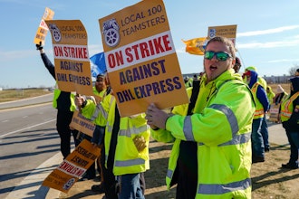 Teamsters protest near the DHL Express Hub at Cincinnati/Northern Kentucky International Airport, Erlanger Ky., Dec. 8, 2023.