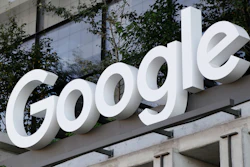 The Google sign is shown over an entrance to the company's new building in New York on Sept. 6, 2023.