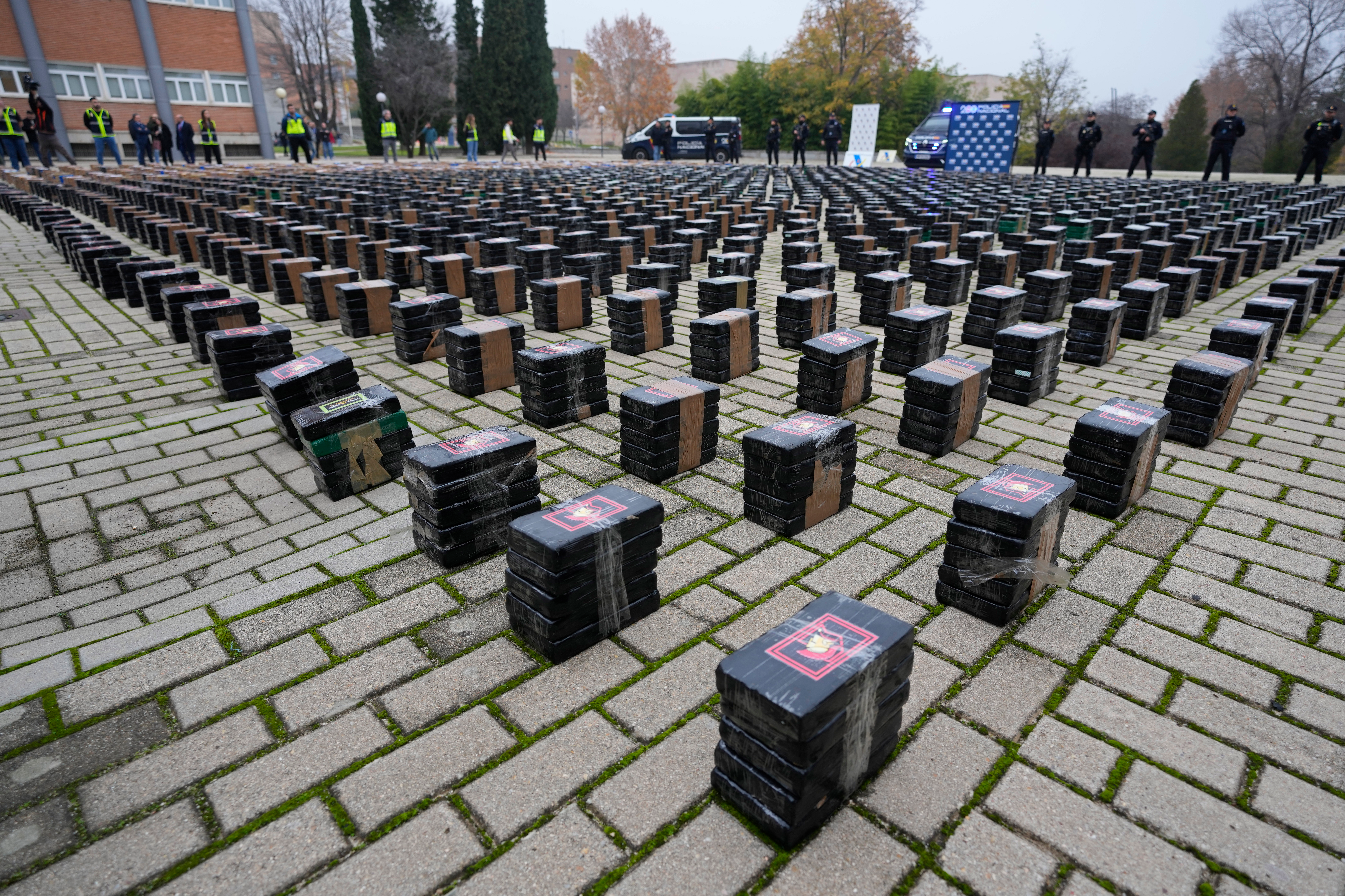 Part of a haul of 11 tons of cocaine is displayed in the patio of a police station in Madrid, Spain, Tuesday, Dec. 12, 2023.