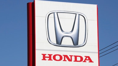 The logo of Honda Motor Co., is seen in Yokohama, near Tokyo on Dec. 15, 2021. Honda Motor’s American arm is recalling more than 2.5 million vehicles in the U.S. due to a fuel pump defect that can increase risks of engine failure or stalling while driving.