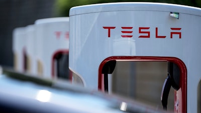 A Tesla charging station is seen, Sept. 28, 2023, in Woodstock, Ga.