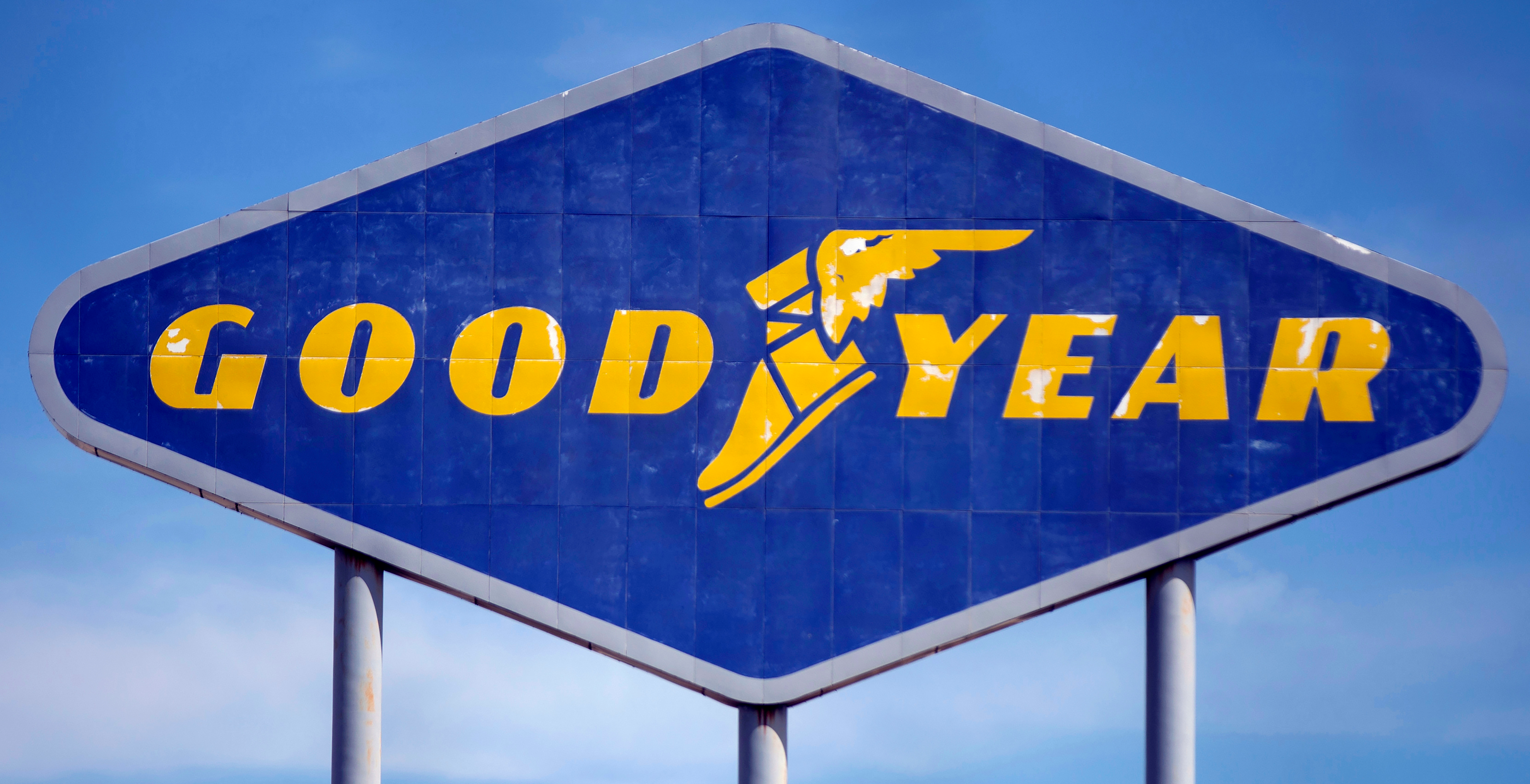 In this Aug. 20, 2020 file photo, signage for the Goodyear Distribution Center stands in Topeka, Kan. Goodyear Tire & Rubber Co. has named former Stellantis executive Mark Stewart as its new CEO.