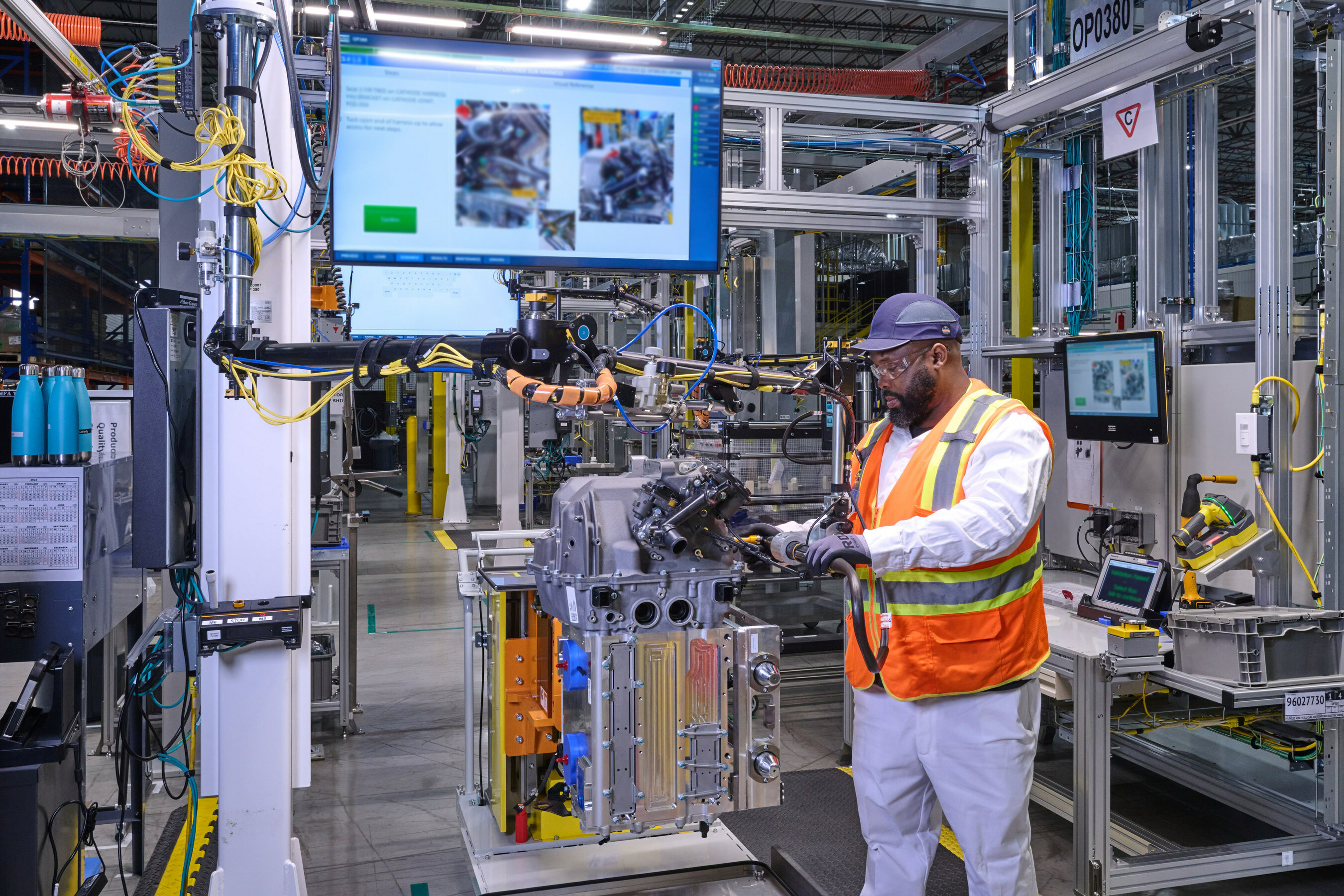 An employee assembles a fuel cell system in the module final assembly at Fuel Cell System Manufacturing LLC, GM and Honda&rsquo;s fuel cell joint venture in Brownstown, Michigan.