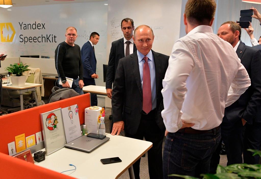 Russian President Vladimir Putin, center, visits Russia's largest internet search engine Yandex headquarters in Moscow, Russia, on Sept. 21, 2017.