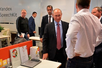 Russian President Vladimir Putin, center, visits Russia's largest internet search engine Yandex headquarters in Moscow, Russia, on Sept. 21, 2017.