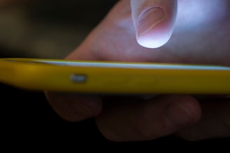 A man uses a cell phone in New Orleans on Aug. 11, 2019.