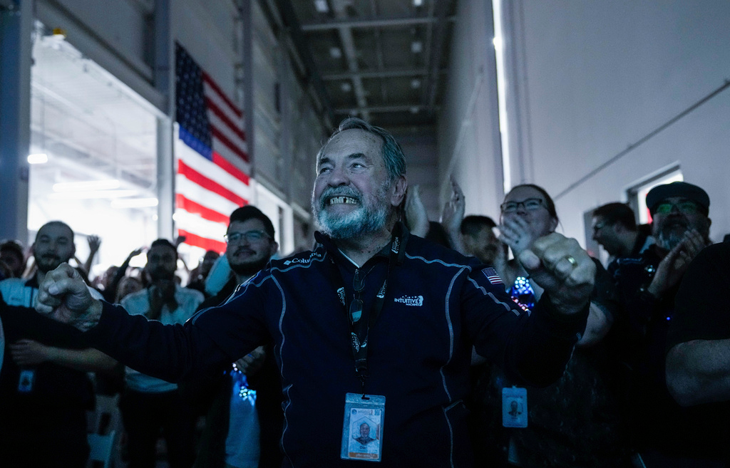 Main Engine Control Computer designer for Intuitive Machines Dan Harrison cheers amongst fellow employees during a watch party moments after they became the first commercial company to softly land on the moon on Thursday, Feb. 22, 2024, in Houston.