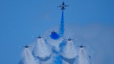 South Korean Air Force's Black Eagles aerobatic team performs during the first day of the Singapore Airshow in Singapore, Tuesday, Feb. 20, 2024.