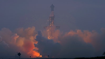 SpaceX's mega rocket Starship launches at dawn in the haze on it's third test flight from Starbase in Boca Chica, Texas, Thursday, March 14, 2024.