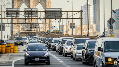 Traffic enters lower Manhattan after crossing the Brooklyn Bridge, Feb. 8, 2024, in New York.
