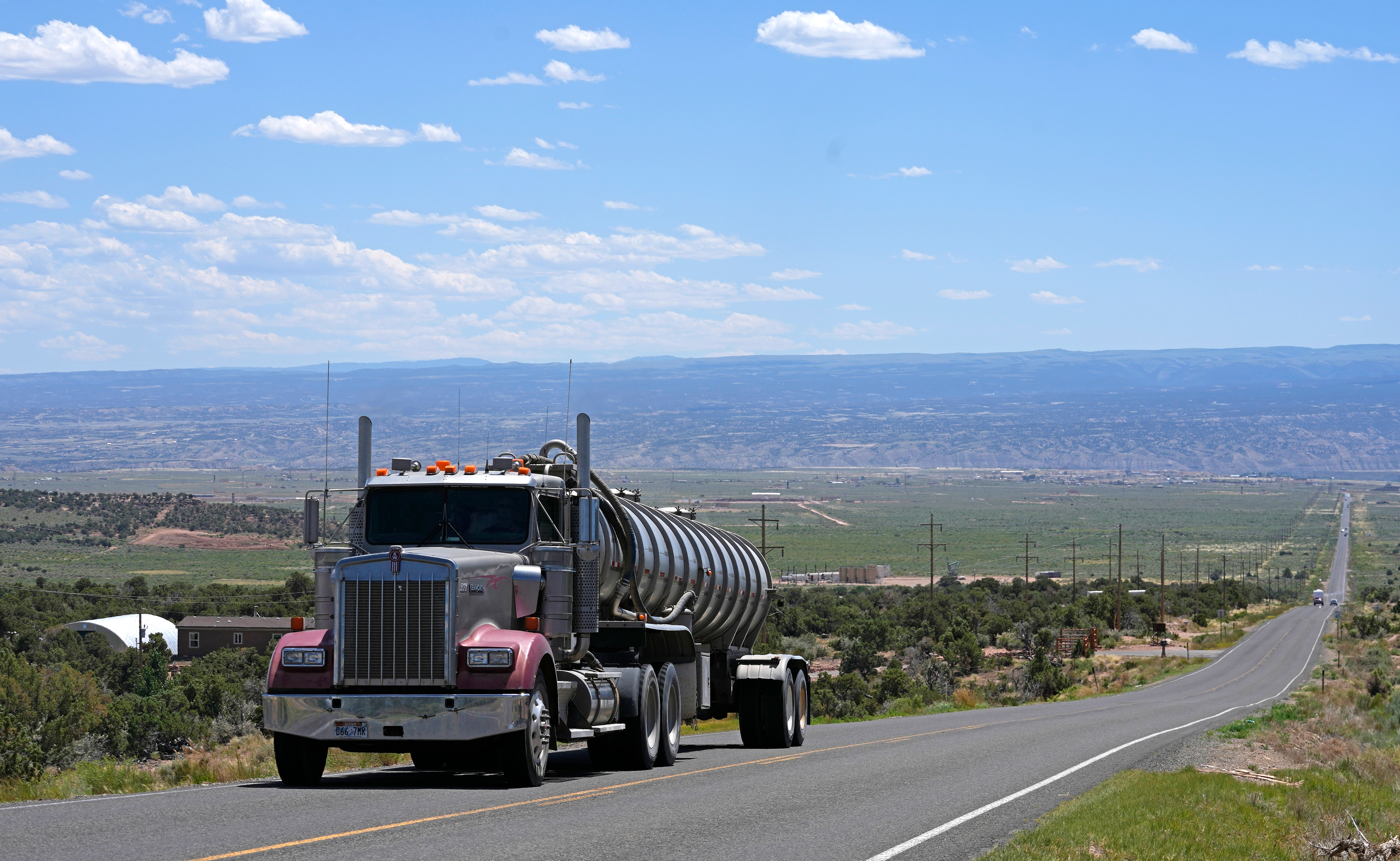 A tanker truck transports crude oil on a highway near Duchesne, Utah on July 13, 2023.