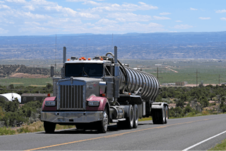 A tanker truck transports crude oil on a highway near Duchesne, Utah on July 13, 2023.