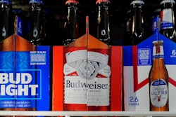 Six-packs of Bud Light, Budweiser and Michelob Ultra are displayed at a liquor store, Wednesday, Feb. 28, 2024, in Fairfield, Calif. Budweiser brewer Anheuser-Busch has reached a contract agreement with the Teamsters union that avoids a strike at its U.S. plants. The union had threatened a strike at the brewer’s 12 U.S. plants if an agreement on a new five-year contract wasn’t reached by 11:59 p.m. EST Thursday.