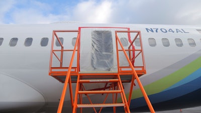 This image taken Jan. 7, 2024, and released by the National Transportation Safety Board, shows a section of the Boeing 737-9 Max that lost a panel in flight, in Portland, Ore.