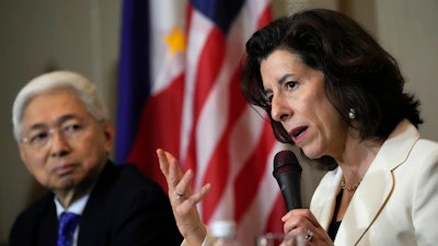 U.S. Commerce Secretary Gina Raimondo, right, talks beside Philippine Trade and Industry Secretary Alfredo Pascual during a press conference at Paranaque city, Philippines on Monday, March 11, 2024.