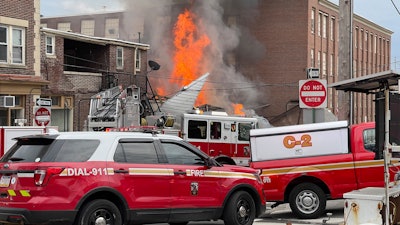 Emergency personnel at the site of an explosion at a chocolate factory in West Reading, Pa., March 25, 2023.
