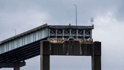 A section of the damaged and collapsed Francis Scott Key Bridge is seen, in the Baltimore port, Monday, April 1, 2024.