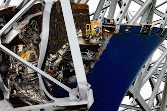 Wreckage of the Francis Scott Key Bridge rests on the container ship Dali, Wednesday, April 3, 2024, in Baltimore.