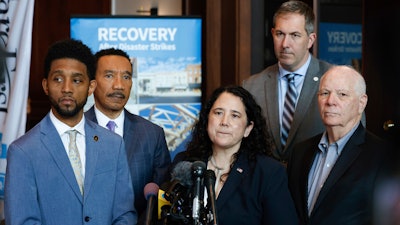 Small Business Administration administrator Isabel Guzman, surrounded by Baltimore Mayor Brandon Scott, from left, Rep. Kweisi Mfume, D-Md., Baltimore County Executive Johnny Olszewski and Sen. Ben Cardin, D-Md., speaks during a press conference at the SBA business recovery center, Thursday, April 4, 2024, in Baltimore.