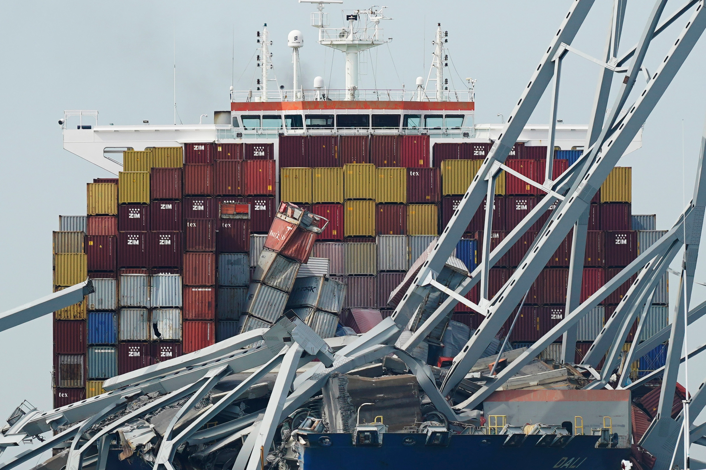 The container ship Dali is stuck under part of the Francis Scott Key Bridge after the ship hit the bridge, March 26, 2024, in Baltimore, Md.