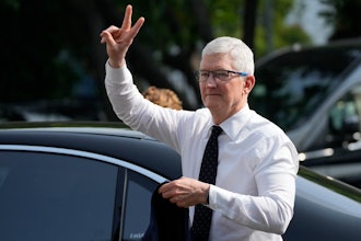 Apple CEO Tim Cook gestures upon the arrival for a meeting with Indonesian President Joko Widodo at palace in Jakarta, Indonesia, Wednesday, April 17, 2024.
