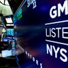 In this April 23, 2018, file photo, the logo for General Motors appears above a trading post on the floor of the New York Stock Exchange.