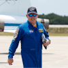 NASA astronaut Butch Wilmore, walks past NASA jets after he arrived at the Kennedy Space Center, Thursday, April 25, 2024, in Cape Canaveral, Fla.