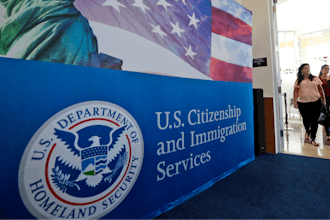 People arrive before the start of a naturalization ceremony at the U.S. Citizenship and Immigration Services Miami Field Office in Miami, Aug. 17, 2018.
