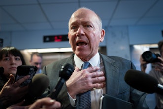 Boeing CEO David Calhoun speaks briefly with reporters after a meeting in the office of Sen. Mark Warner, D-Va., at the Capitol in Washington, Jan. 24, 2024.