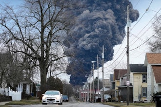 A black plume rises over East Palestine, Ohio, as a result of a controlled detonation of a portion of the derailed Norfolk Southern trains Monday, Feb. 6, 2023.
