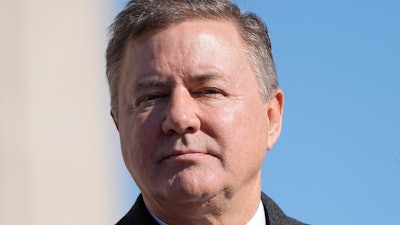 Oklahoma Attorney General Gentner Drummond stands during the playing of the national anthem at the inauguration ceremonies, Jan. 9, 2023, in Oklahoma City.