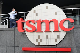 A person walks into the Taiwan Semiconductor Manufacturing Co., headquarters in Hsinchu, Taiwan on Oct. 20, 2021.
