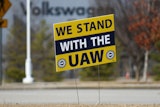A 'We stand with the UAW' sign appears outside of the Volkswagen plant in Chattanooga, Tenn., on Dec. 18, 2023.