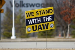 A 'We stand with the UAW' sign appears outside of the Volkswagen plant in Chattanooga, Tenn., on Dec. 18, 2023.