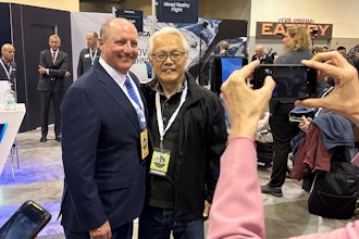 Berkshire Hathaway Vice Chairman Greg Abel poses for pictures with shareholders, May 3, 2024, Omaha, Neb.