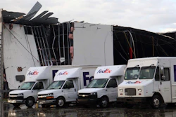 FedEx trucks outside a damaged FedEx facility in Portage, Mich., May 7, 2024.