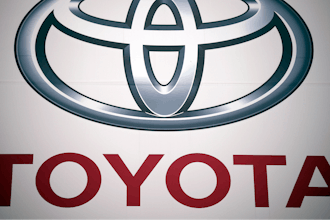 The Toyota Motor Corp. logo is seen, May 11, 2022, at a dealer in Tokyo.
