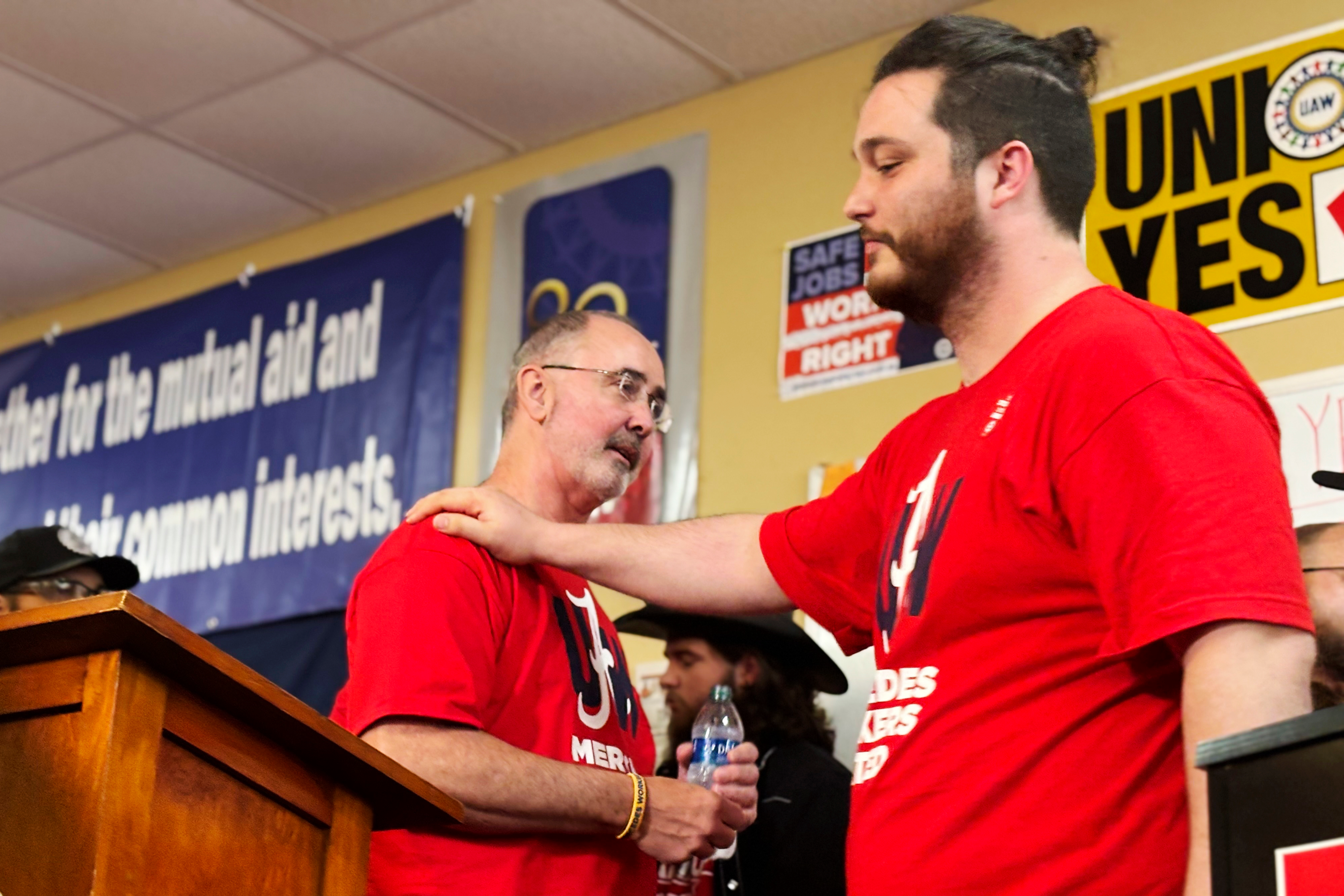 David Johnston, right, a worker at Mercedes, thanks UAW President Shawn Fain following a press conference in Tuscaloosa, Alabama on May 17, 2024, after workers at two Alabama Mercedes-Benz factories voted overwhelmingly against joining the United Auto Workers union.