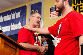 David Johnston, right, a worker at Mercedes, thanks UAW President Shawn Fain following a press conference in Tuscaloosa, Alabama on May 17, 2024, after workers at two Alabama Mercedes-Benz factories voted overwhelmingly against joining the United Auto Workers union.