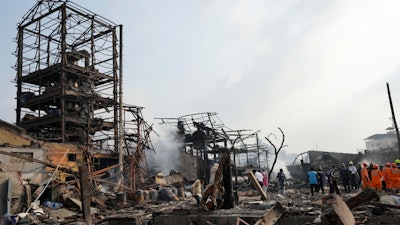 National Disaster Response Force rescuers work at the site after an explosion and fire at a chemical factory in Dombivali near Mumbai, India, Friday, May 24, 2024.