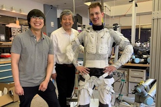 SuperLimbs, a system of wearable robotic limbs built by MIT engineers, is designed to physically support an astronaut and lift them back on their feet after a fall, helping them conserve energy for other essential tasks. Pictured, from left, is Sang-Yoep Lee, Harry Asada, and Erik Ballesteros.