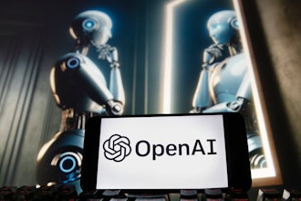 The OpenAI logo is seen displayed on a cell phone with an image on a computer monitor generated by ChatGPT's Dall-E text-to-image model, Friday, Dec. 8, 2023, in Boston.