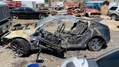 This image provided by Colorado State Patrol shows a Tesla Model 3 that crashed on May 16, 2022 in Clear Creek County, Colo.
