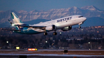A WestJet plane takes off in Calgary.