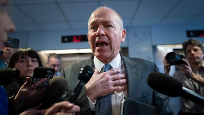 Boeing CEO David Calhoun speaks with reporters after a meeting at the Capitol in Washington, Jan. 24, 2024.