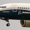 A Boeing 737 Max jet prepares to land at Boeing Field following a test flight in Seattle, Sept. 30, 2020.