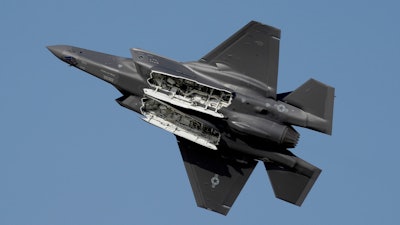 A US F-35 fighter jet performs during the opening day of the Dubai Air Show, United Arab Emirates.