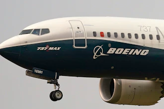 A Boeing 737 Max jet, piloted by Federal Aviation Administration (FAA) chief Steve Dickson, prepares to land at Boeing Field following a test flight on Sept. 30, 2020 in Seattle.