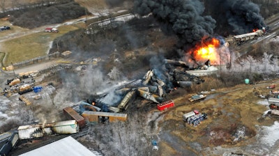 Debris from a Norfolk Southern freight train lies scattered and burning along the tracks Feb. 4, 2023, the day after it derailed in East Palestine, Ohio.