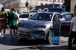 Visitors watch a BYD Seal U car at the IAA motor show in Munich, Germany.